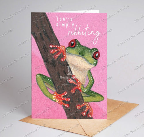 Greeting card with a frog illustration and 'You're simply ribbiting' text on a pink background.