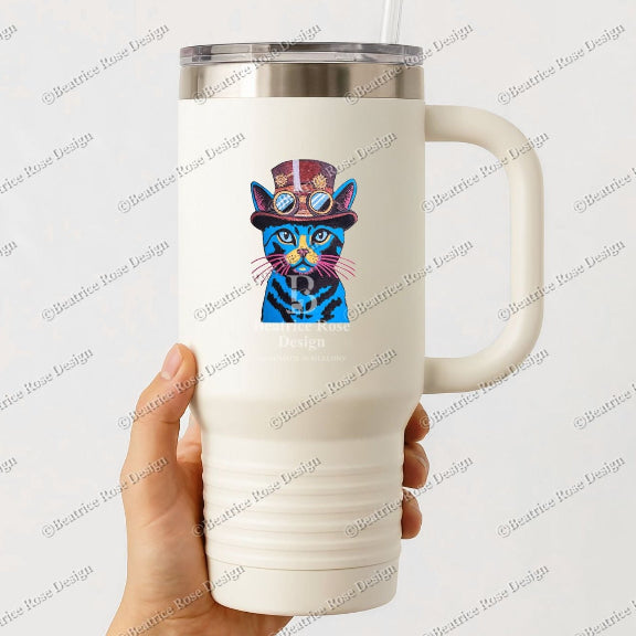 White travel mug with a colorful cat design held by a hand on a white background